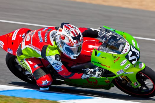 JEREZ DE LA FRONTERA, SPAIN - APR 17: 125cc motorcyclist Juanfran Guevara takes a curve in the CEV Championship race on April 17, 2011 in Jerez de la Frontera, Spain.