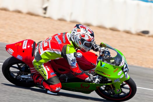 JEREZ DE LA FRONTERA, SPAIN - APR 17: 125cc motorcyclist Juanfran Guevara takes a curve in the CEV Championship race on April 17, 2011 in Jerez de la Frontera, Spain.