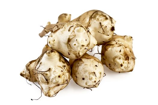 Five tubers of Jerusalem artichoke is isolated on a white background