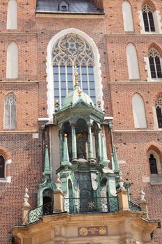 St. Mary's Basilica is a Brick Gothic church re-built in the 14th century (originally built in the early 13th century), adjacent to the Main Market Square in Kraków, Poland.