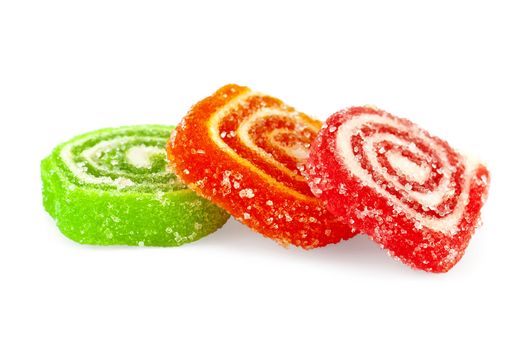 Three jelly green, red and orange with a white layer is isolated on a white background