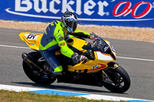 JEREZ DE LA FRONTERA, SPAIN - APR 17: Stock Extreme motorcyclist Juan Eric Gomez takes a curve in the CEV Championship race on April 17, 2011 in Jerez de la Frontera, Spain