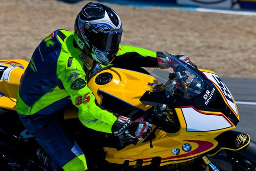 JEREZ DE LA FRONTERA, SPAIN - APR 17: Stock Extreme motorcyclist Juan Eric Gomez takes a curve in the CEV Championship race on April 17, 2011 in Jerez de la Frontera, Spain