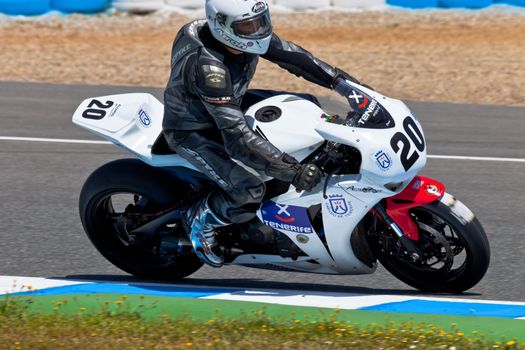 JEREZ DE LA FRONTERA, SPAIN - APR 17: Stock Extreme motorcyclist Juan Alonso takes a curve in the CEV Championship race on April 17, 2011 in Jerez de la Frontera, Spain