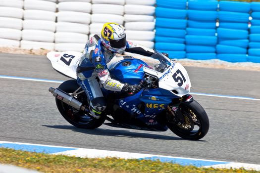 JEREZ DE LA FRONTERA, SPAIN - APR 17: Stock Extreme motorcyclist Ferran Casas takes a curve in the CEV Championship race on April 17, 2011 in Jerez de la Frontera, Spain