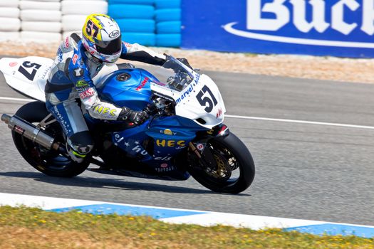 JEREZ DE LA FRONTERA, SPAIN - APR 17: Stock Extreme motorcyclist Ferran Casas takes a curve in the CEV Championship race on April 17, 2011 in Jerez de la Frontera, Spain