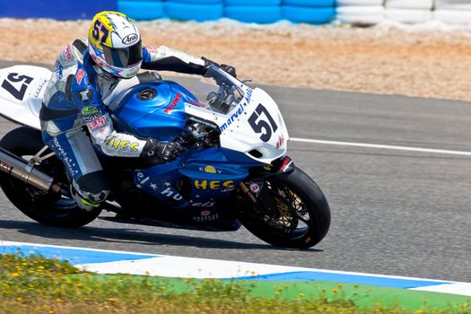 JEREZ DE LA FRONTERA, SPAIN - APR 17: Stock Extreme motorcyclist Ferran Casas takes a curve in the CEV Championship race on April 17, 2011 in Jerez de la Frontera, Spain