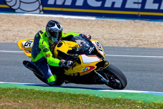 JEREZ DE LA FRONTERA, SPAIN - APR 17: Stock Extreme motorcyclist Juan Eric Gomez takes a curve in the CEV Championship race on April 17, 2011 in Jerez de la Frontera, Spain