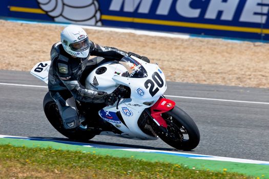 JEREZ DE LA FRONTERA, SPAIN - APR 17: Stock Extreme motorcyclist Juan Alonso takes a curve in the CEV Championship race on April 17, 2011 in Jerez de la Frontera, Spain