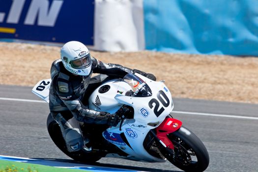 JEREZ DE LA FRONTERA, SPAIN - APR 17: Stock Extreme motorcyclist Juan Alonso takes a curve in the CEV Championship race on April 17, 2011 in Jerez de la Frontera, Spain