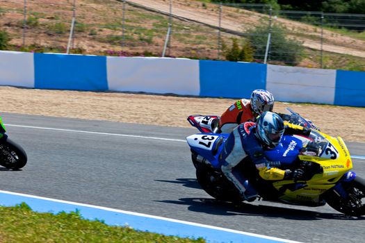 JEREZ DE LA FRONTERA, SPAIN - APR 17: Stock Extreme motorcyclist Jorge Arroyo takes a curve in the CEV Championship race on April 17, 2011 in Jerez de la Frontera, Spain