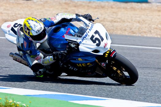 JEREZ DE LA FRONTERA, SPAIN - APR 17: Stock Extreme motorcyclist Ferran Casas takes a curve in the CEV Championship race on April 17, 2011 in Jerez de la Frontera, Spain