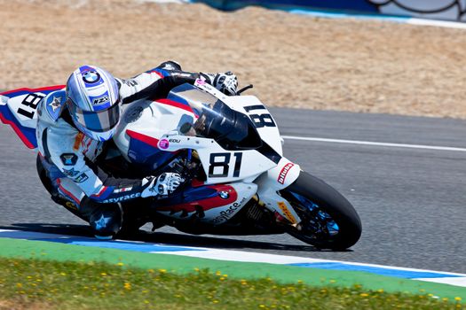 JEREZ DE LA FRONTERA, SPAIN - APR 17: Stock Extreme motorcyclist Eduardo Salvador takes a curve in the CEV Championship race on April 17, 2011 in Jerez de la Frontera, Spain