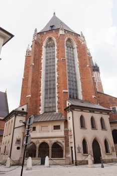 St. Mary's Basilica is a Brick Gothic church re-built in the 14th century (originally built in the early 13th century), adjacent to the Main Market Square in Kraków, Poland.