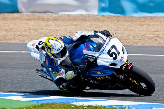 JEREZ DE LA FRONTERA, SPAIN - APR 17: Stock Extreme motorcyclist Ferran Casas takes a curve in the CEV Championship race on April 17, 2011 in Jerez de la Frontera, Spain