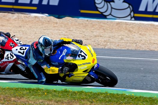 JEREZ DE LA FRONTERA, SPAIN - APR 17: Stock Extreme motorcyclist Jorge Arroyo takes a curve in the CEV Championship race on April 17, 2011 in Jerez de la Frontera, Spain