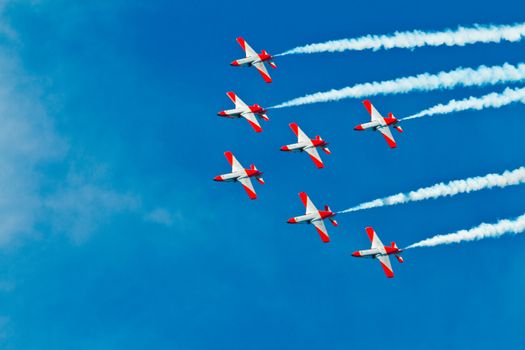 CADIZ, SPAIN-SEP 9: Aircrafts of the Patrulla Aguila taking part in a test on the 4th airshow of Cadiz on Sep 9, 2011, in Cadiz, Spain