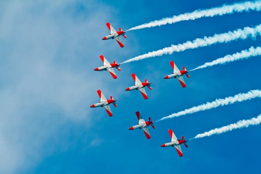 CADIZ, SPAIN-SEP 9: Aircrafts of the Patrulla Aguila taking part in a test on the 4th airshow of Cadiz on Sep 9, 2011, in Cadiz, Spain