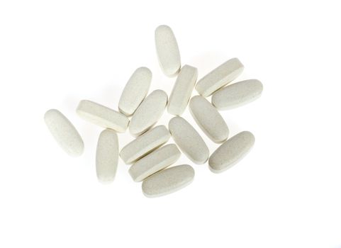 white medical tablets, photo on the white background