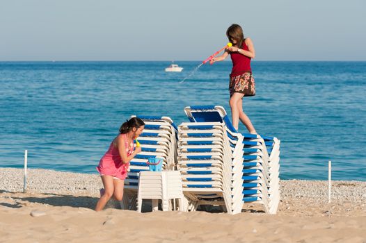 Crazy girls having a lot of fun at a water fight