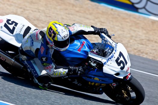 JEREZ DE LA FRONTERA, SPAIN - APR 17: Stock Extreme motorcyclist Ferran Casas takes a curve in the CEV Championship race on April 17, 2011 in Jerez de la Frontera, Spain