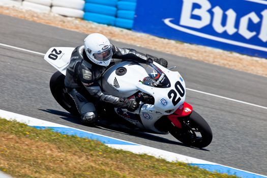 JEREZ DE LA FRONTERA, SPAIN - APR 17: Stock Extreme motorcyclist Juan Alonso takes a curve and move forward to Felix Rodriguez in the CEV Championship race on April 17, 2011 in Jerez de la Frontera, Spain