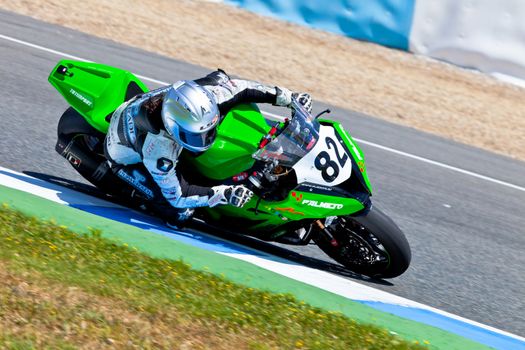 JEREZ DE LA FRONTERA, SPAIN - APR 17: Stock Extreme motorcyclist Elena Rosell takes a curve in the CEV Championship race on April 17, 2011 in Jerez de la Frontera, Spain