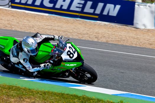 JEREZ DE LA FRONTERA, SPAIN - APR 17: Stock Extreme motorcyclist Elena Rosell takes a curve in the CEV Championship race on April 17, 2011 in Jerez de la Frontera, Spain