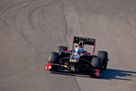 JEREZ DE LA FRONTERA, SPAIN - FEB 11: Vitaly Petrov of Lotus Renault F1 races on training session on February 11 , 2011, in Jerez de la Frontera , Spain