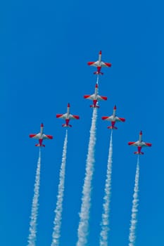 CADIZ, SPAIN-SEP 9: Aircrafts of the Patrulla Aguila taking part in a test on the 4th airshow of Cadiz on Sep 9, 2011, in Cadiz, Spain