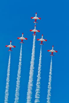 CADIZ, SPAIN-SEP 9: Aircrafts of the Patrulla Aguila taking part in a test on the 4th airshow of Cadiz on Sep 9, 2011, in Cadiz, Spain