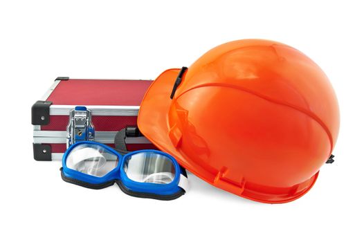 The orange helmet, a red suitcase for tools, safety glasses with black blue isolated on white background