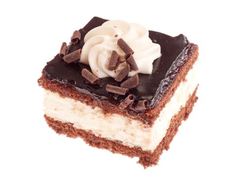 Slice of chocolate cream cake, isolated on white