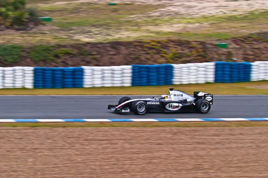 JEREZ DE LA FRONTERA, SPAIN - DEC 04: Pedro de la Rosa of McLaren Mercedes F1 races during a training session on December 04, 2004, in Jerez de la Frontera, Spain