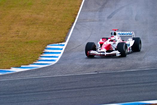 JEREZ DE LA FRONTERA, SPAIN - DEC 04: Jarno Trulli of Toyota F1 takes a curve during a training session on December 04, 2004, in Jerez de la Frontera, Spain