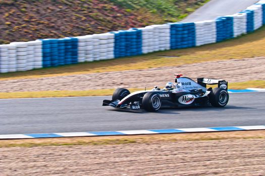 JEREZ DE LA FRONTERA, SPAIN - DEC 04: Alex Wurz of McLaren Mercedes F1 races during a training session on December 04, 2004, in Jerez de la Frontera, Spain