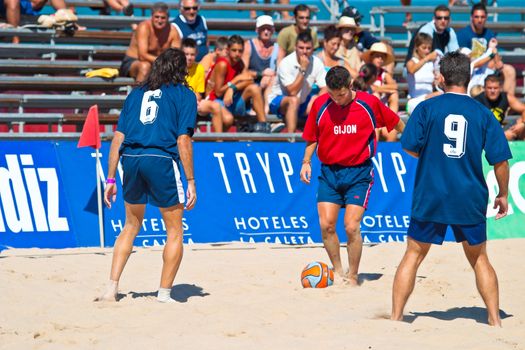 CADIZ, SPAIN -  JUL 30:  Unknown players of the team of Cadiz and Gijon playing the Spanish Championship of Beach Soccer on Jul 30, 2005 on the beach of La Victoria in Cadiz, Spain