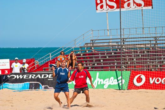 CADIZ, SPAIN -  JUL 30:  Unknown players of the team of Cadiz and Gijon playing the Spanish Championship of Beach Soccer on Jul 30, 2005 on the beach of La Victoria in Cadiz, Spain