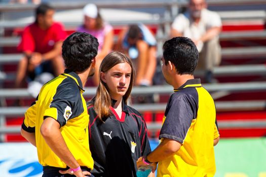 CADIZ, SPAIN -  JUL 30:  Unknown referee,  refereeing a match of the Spanish Championship of Beach Soccer on Jul 30, 2005 on the beach of La Victoria in Cadiz, Spain