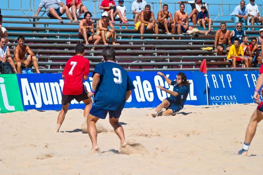 CADIZ, SPAIN -  JUL 30:  Unknown players of the team of Cadiz and Gijon playing the Spanish Championship of Beach Soccer on Jul 30, 2005 on the beach of La Victoria in Cadiz, Spain