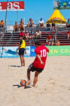 CADIZ, SPAIN -  JUL 30:  Unknown player of the team of Gijon playing the Spanish Championship of Beach Soccer on Jul 30, 2005 on the beach of La Victoria in Cadiz, Spain