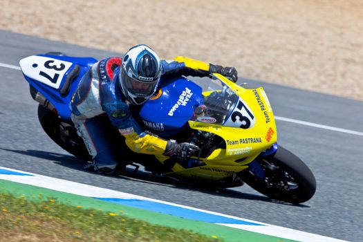 JEREZ DE LA FRONTERA, SPAIN - APR 17: Stock Extreme motorcyclist Jorge Arroyo takes a curve in the CEV Championship race on April 17, 2011 in Jerez de la Frontera, Spain