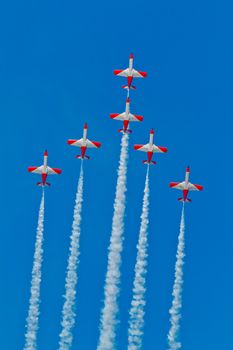 CADIZ, SPAIN-SEP 9: Aircrafts of the Patrulla Aguila taking part in a test on the 4th airshow of Cadiz on Sep 9, 2011, in Cadiz, Spain