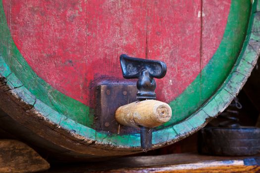 Italy - old tap on a barrel of Barbera wine, Piedmont region