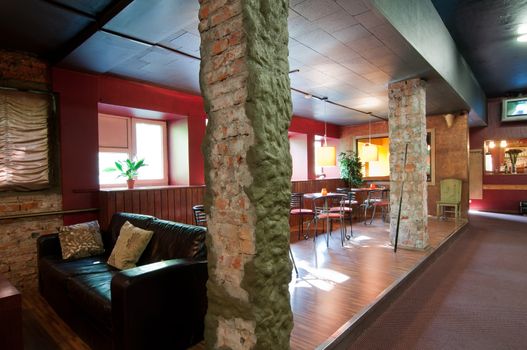 Shot of tables and chairs in billiard room