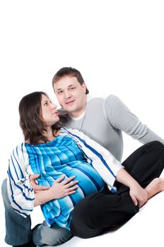 Shot of beautiful couple, pregnant woman isolated on white