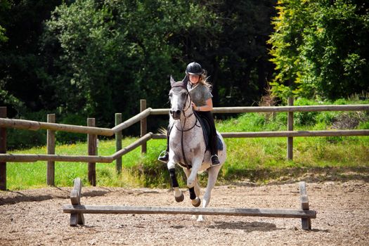 This image shows a portrait from a riding girl