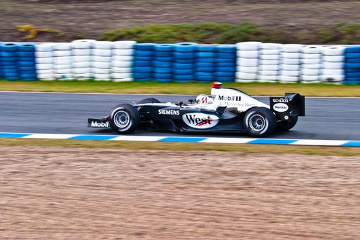 JEREZ DE LA FRONTERA, SPAIN - DEC 04: Alex Wurz of McLaren Mercedes F1 races during a training session on December 04, 2004, in Jerez de la Frontera, Spain
