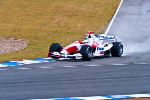 JEREZ DE LA FRONTERA, SPAIN - DEC 04: Jarno Trulli of Toyota F1 takes a curve during a training session on December 04, 2004, in Jerez de la Frontera, Spain