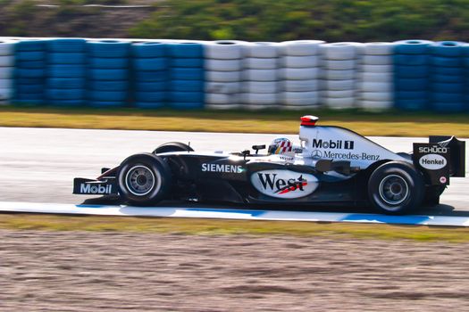 JEREZ DE LA FRONTERA, SPAIN - DEC 04: Alex Wurz of McLaren Mercedes F1 races during a training session on December 04, 2004, in Jerez de la Frontera, Spain